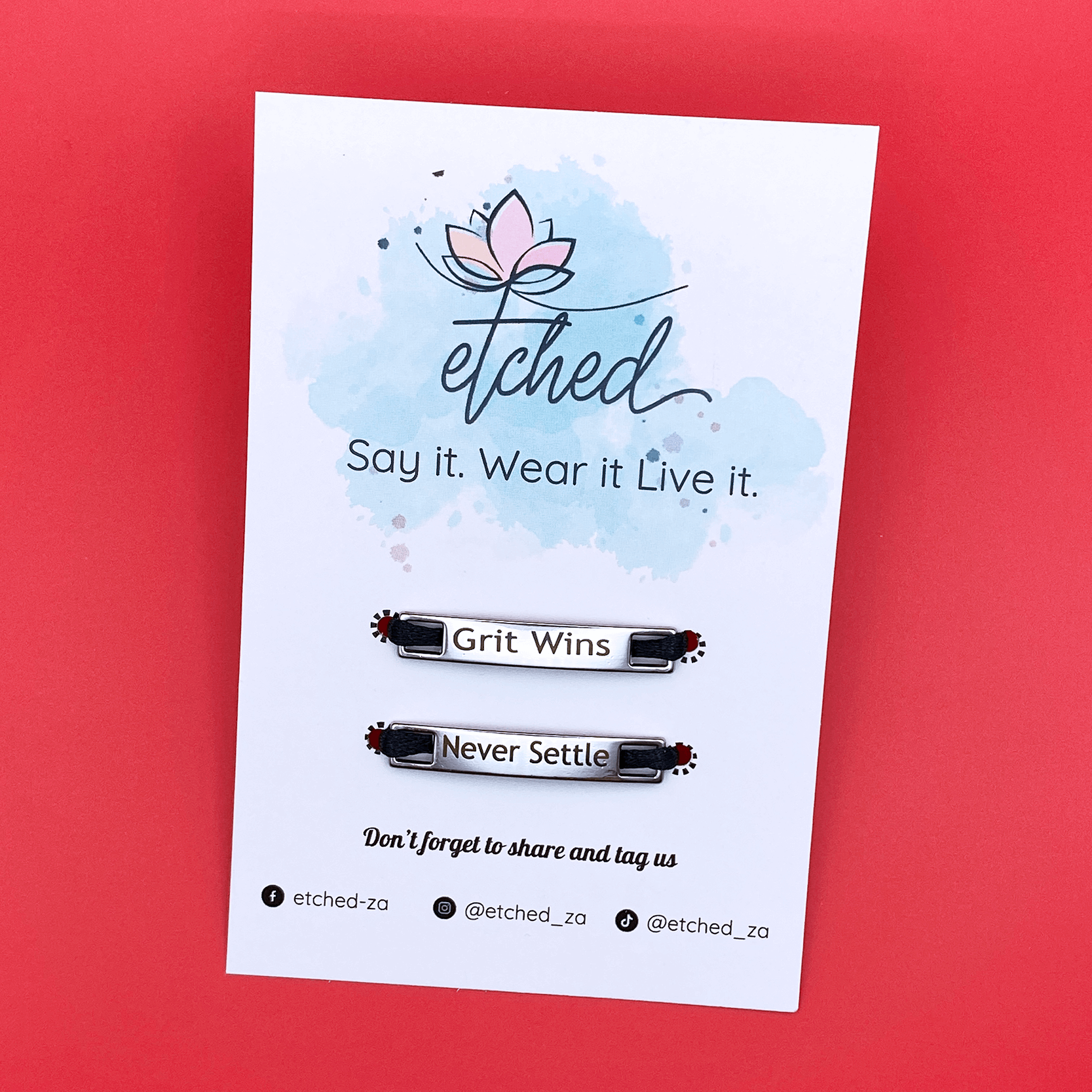 Image of etched product card showing the Grit wins Never Settle shoe tags