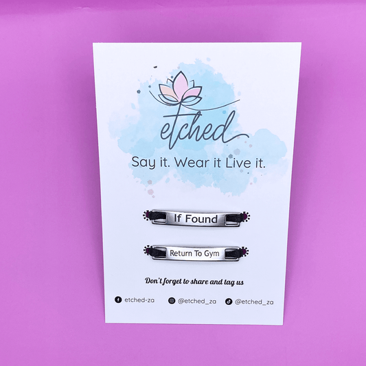 Image of etched product card showing the If Found Return to Gym shoe tags on a purple background